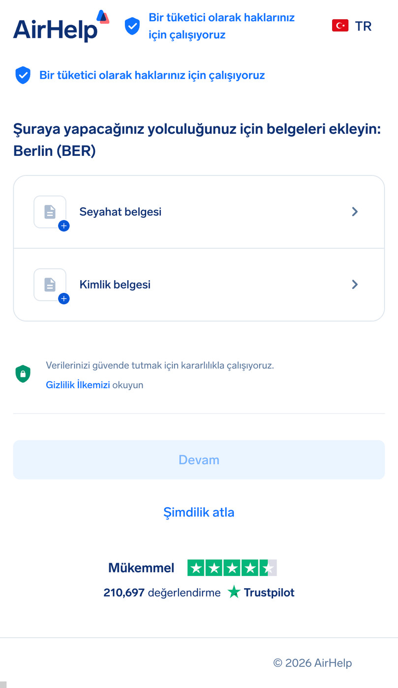Veri güvenliği simgesi içeren seyahat ve kimlik belgeleri yükleme bölümü.