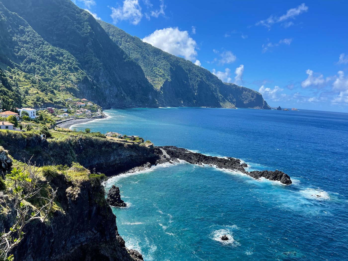 Stunning view of Seixal's cliffs and turquoise waters in Madeira, Portugal.