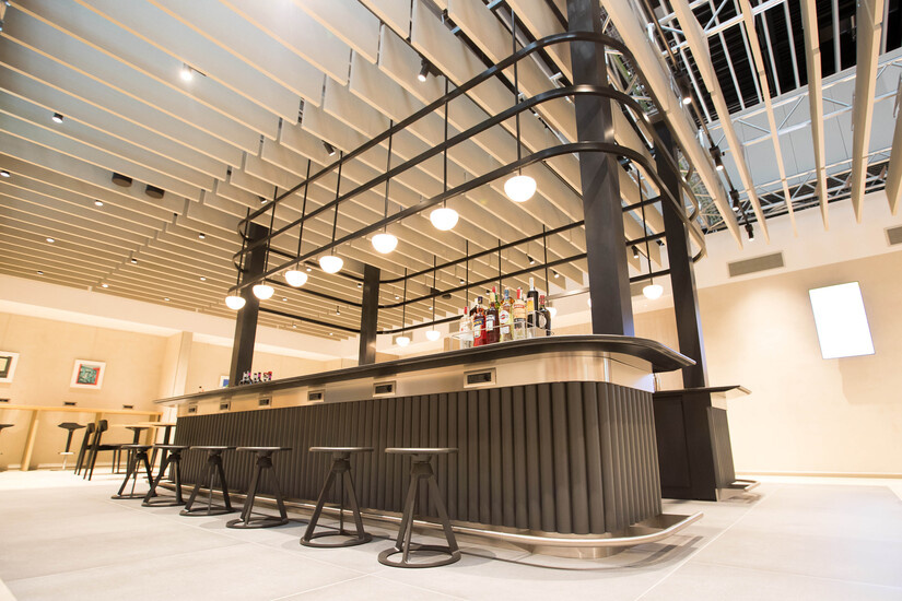 British Airways Lounge bar with lamps hanging from the ceiling