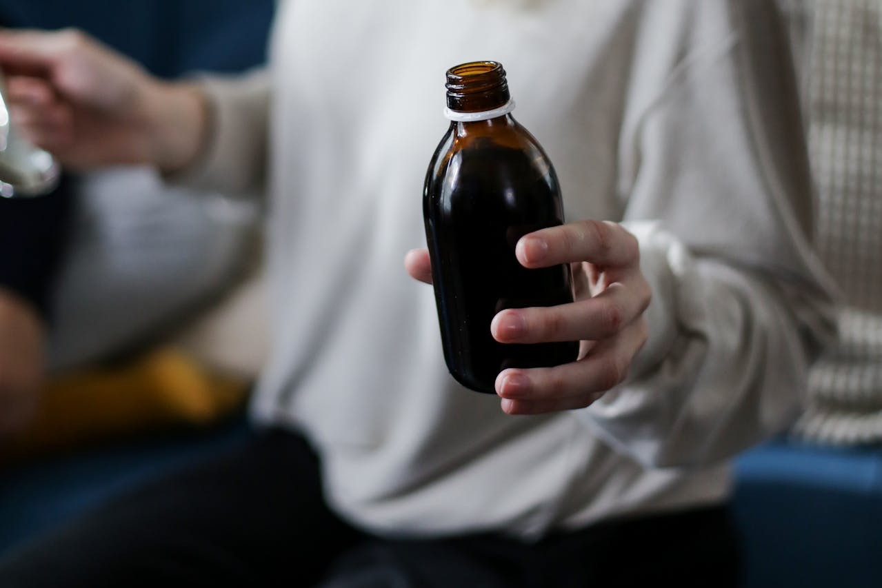 Person with liquid medicine