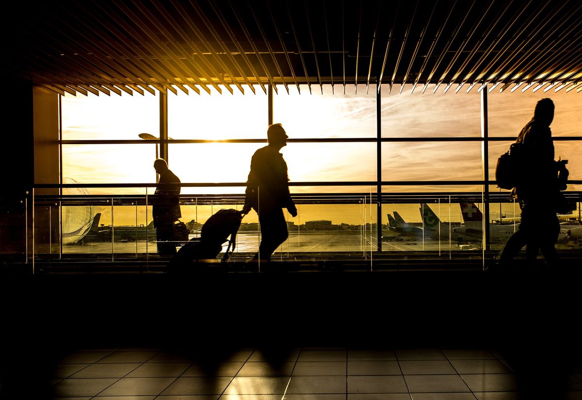 Passengers walking in airport terminals