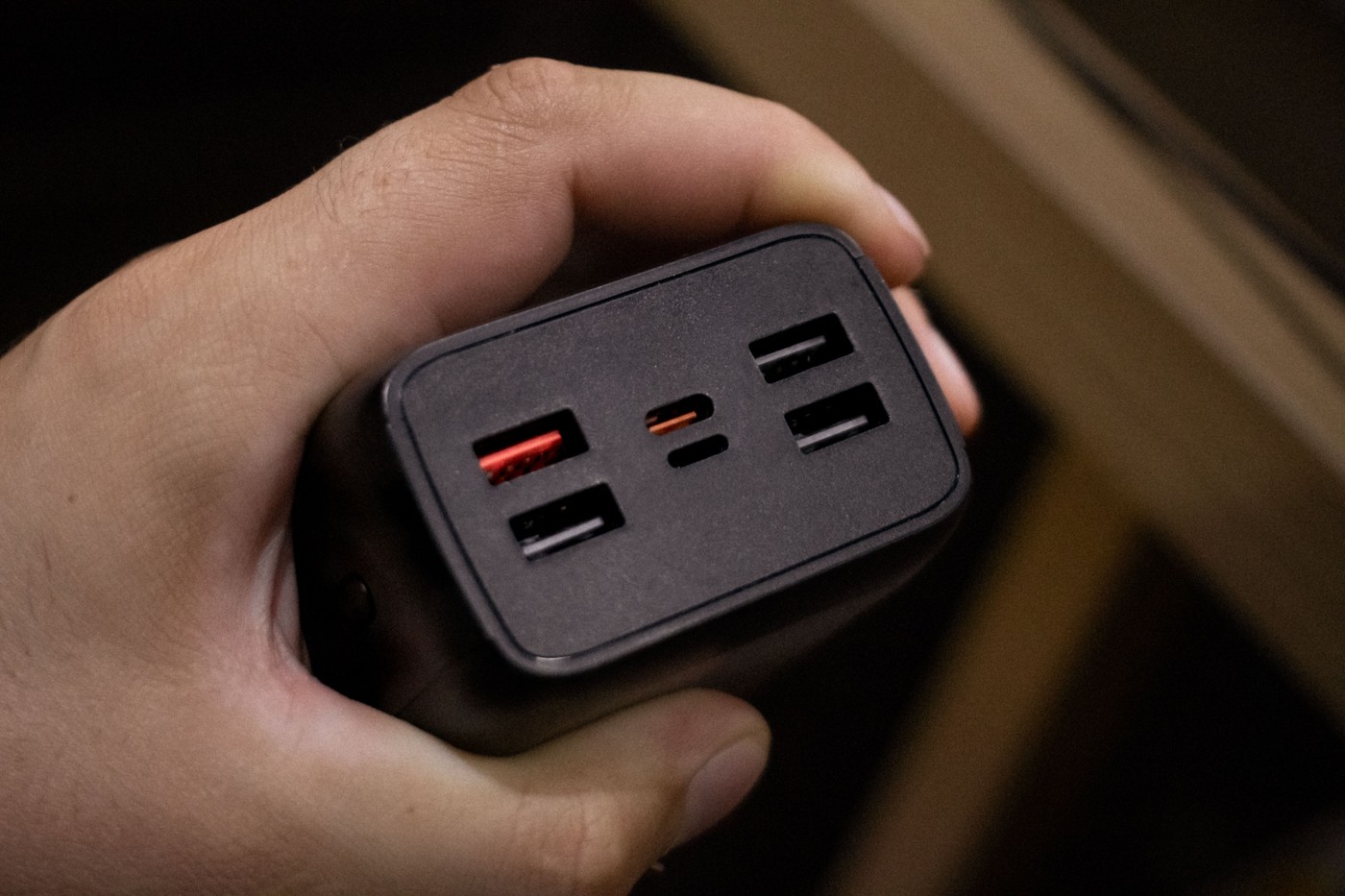 Charger in someone's hand