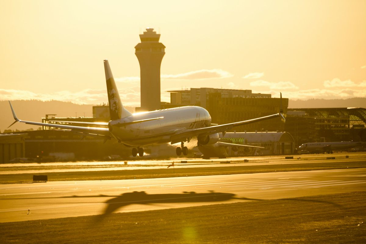 Airplane landing into the runway at airport