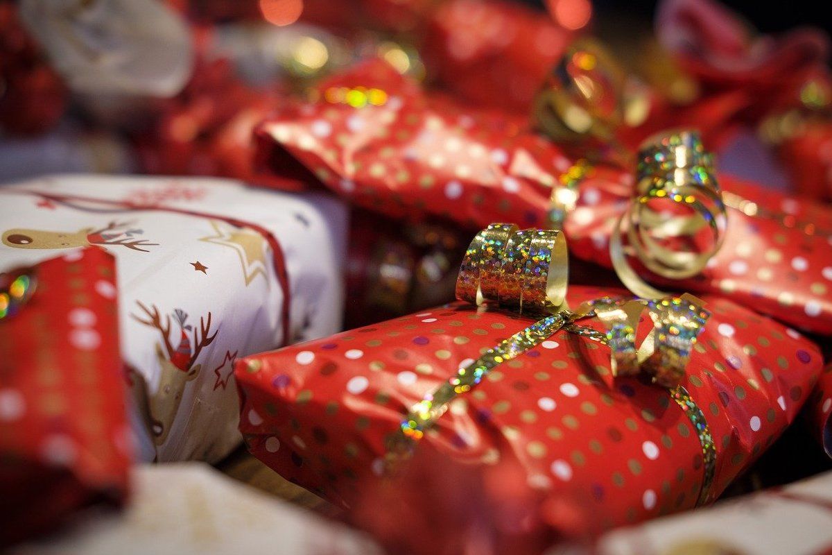 Gifts wrapped up in Christmas wrapping paper and ribbon