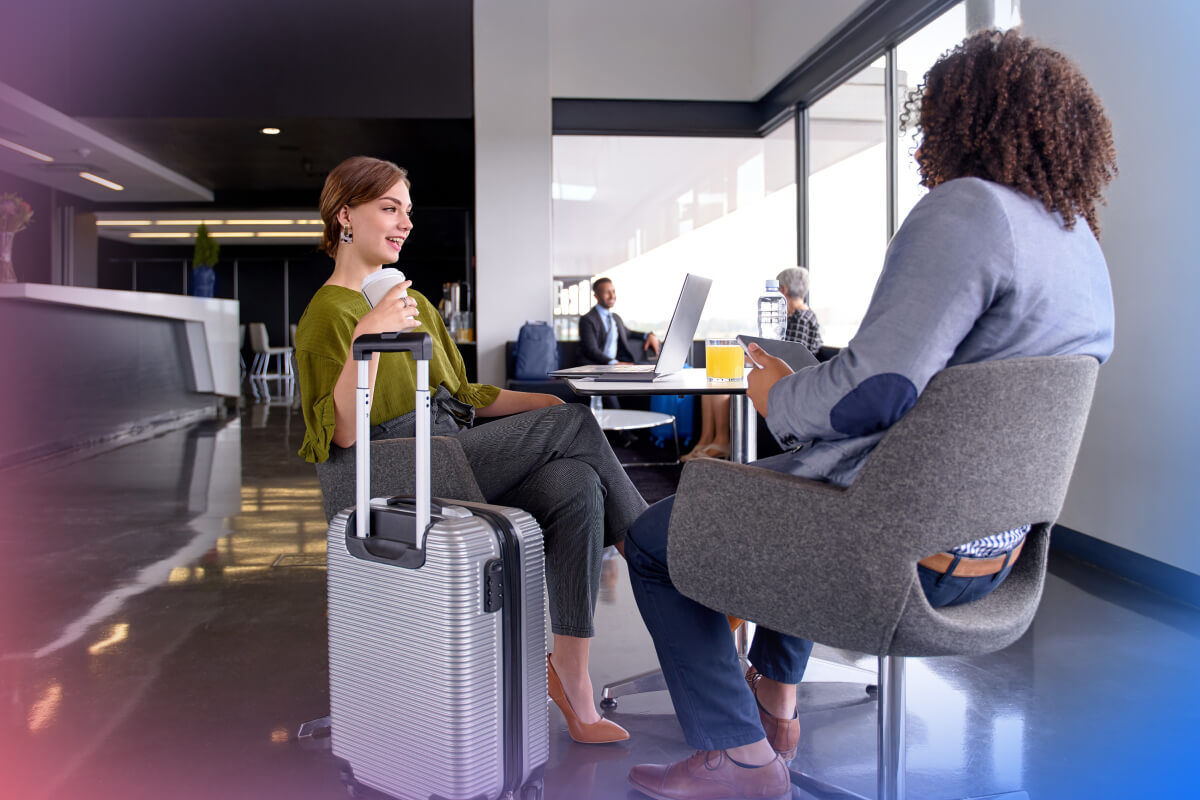 Passengers having conversation in the airport lounge
