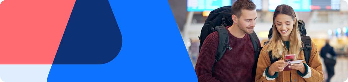 Two passengers, protected by EU regulation EC 261, look at their boarding pass